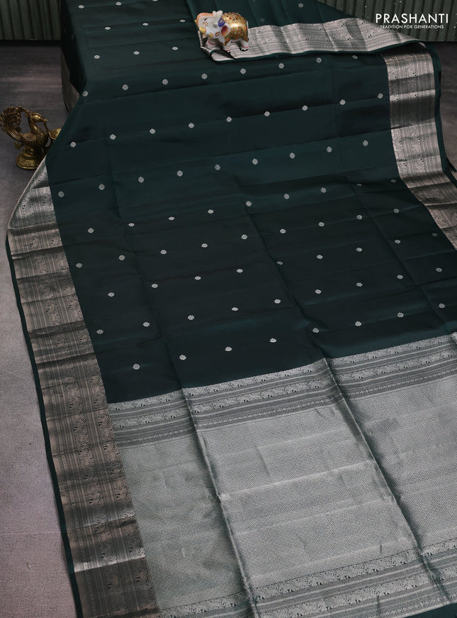 Pure soft silk saree bottle green with silver zari woven buttas and rich silver zari woven border