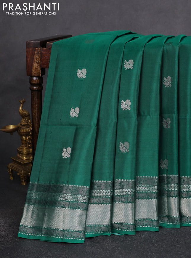 Pure soft silk saree teal green with silver zari woven annam buttas and silver zari woven border