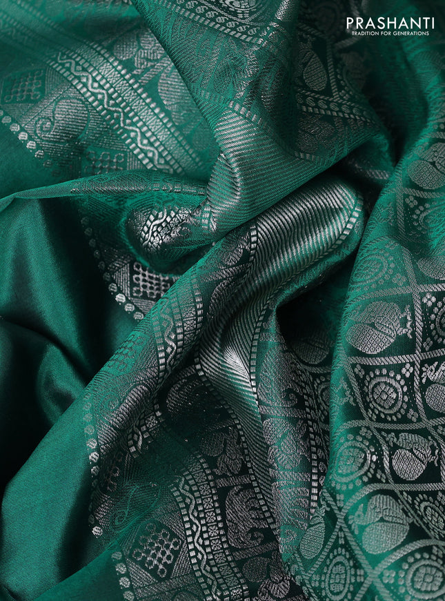 Pure soft silk saree teal green with silver zari woven annam buttas and silver zari woven border