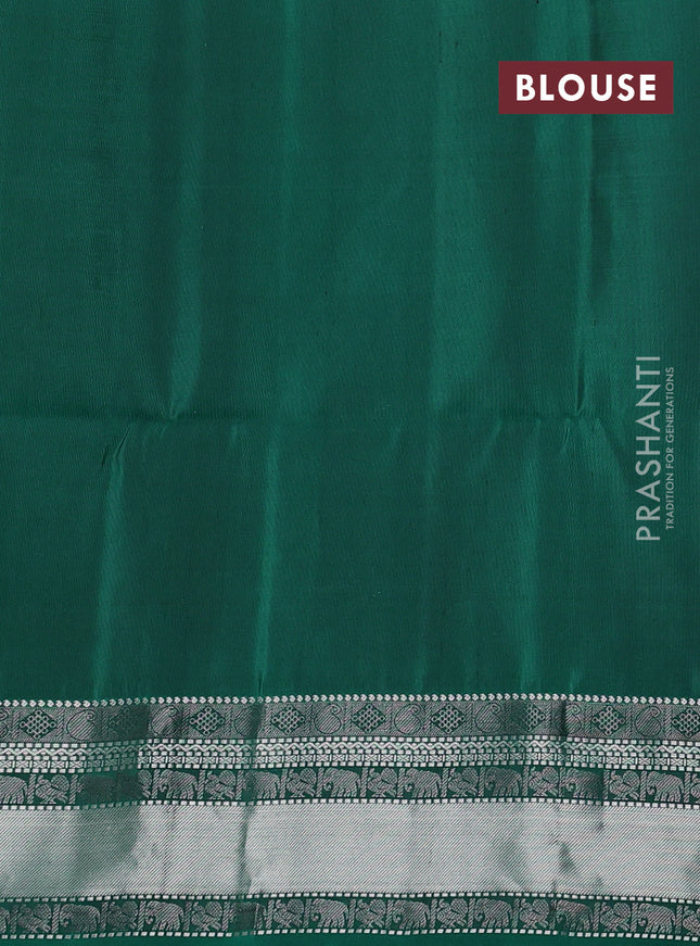 Pure soft silk saree teal green with silver zari woven annam buttas and silver zari woven border