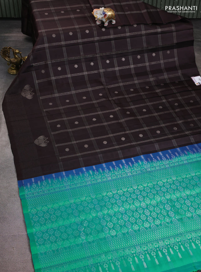 Pure soft silk saree coffee brown and dual shade of teal green with allover silver zari checks & buttas and long silver zari woven border