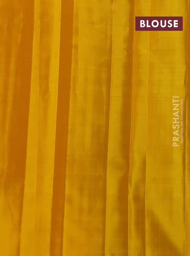 Pure soft silk saree dual shade of teal bluish green and yellow with allover silver zari checked pattern and paisley silver zari woven butta border