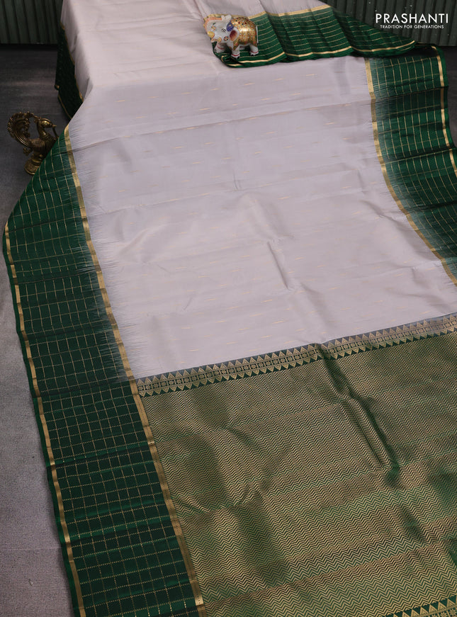 Pure soft silk saree pastel grey and green with zari woven buttas and long zari woven checked border