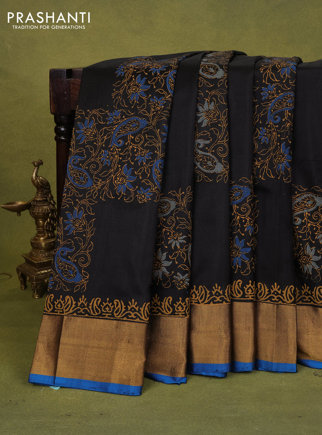 Uppada block printed silk saree black and cs blue with allover paisley prints and zari woven printed border