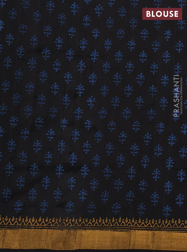 Uppada block printed silk saree black with floral butta prints and zari woven border