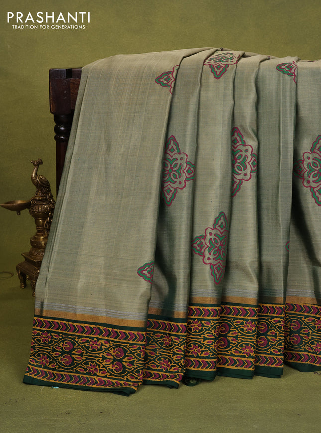 Uppada block printed silk saree pastel green and bottle green with allover prints and zari printed border