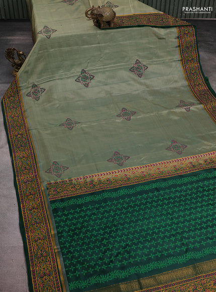 Uppada block printed silk saree pastel green and bottle green with allover prints and zari printed border