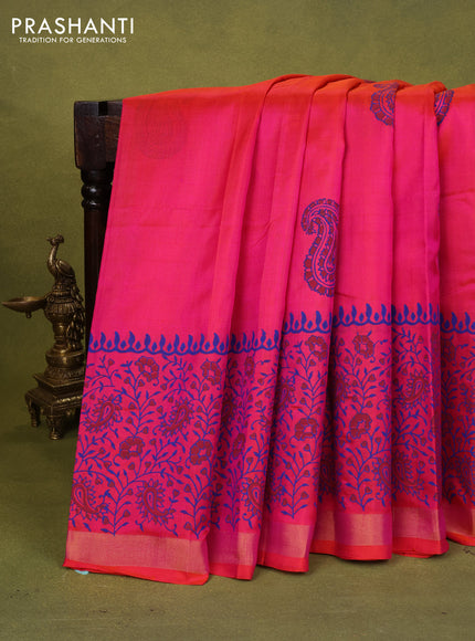 Uppada block printed silk saree dual shade of pinkish orange with paisley butta prints and zari woven border