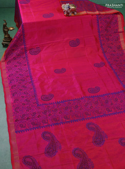 Uppada block printed silk saree dual shade of pinkish orange with paisley butta prints and zari woven border