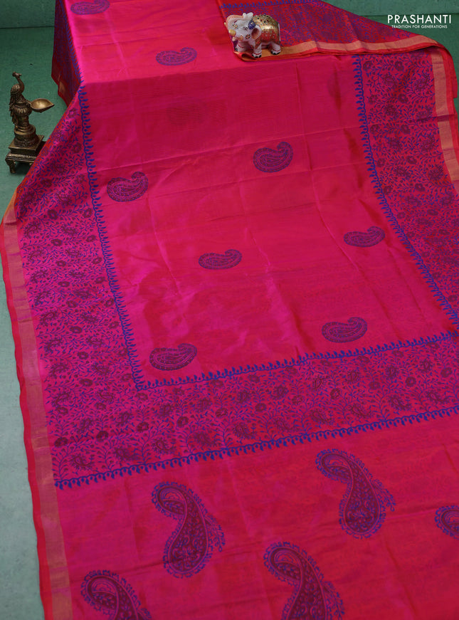 Uppada block printed silk saree dual shade of pinkish orange with paisley butta prints and zari woven border