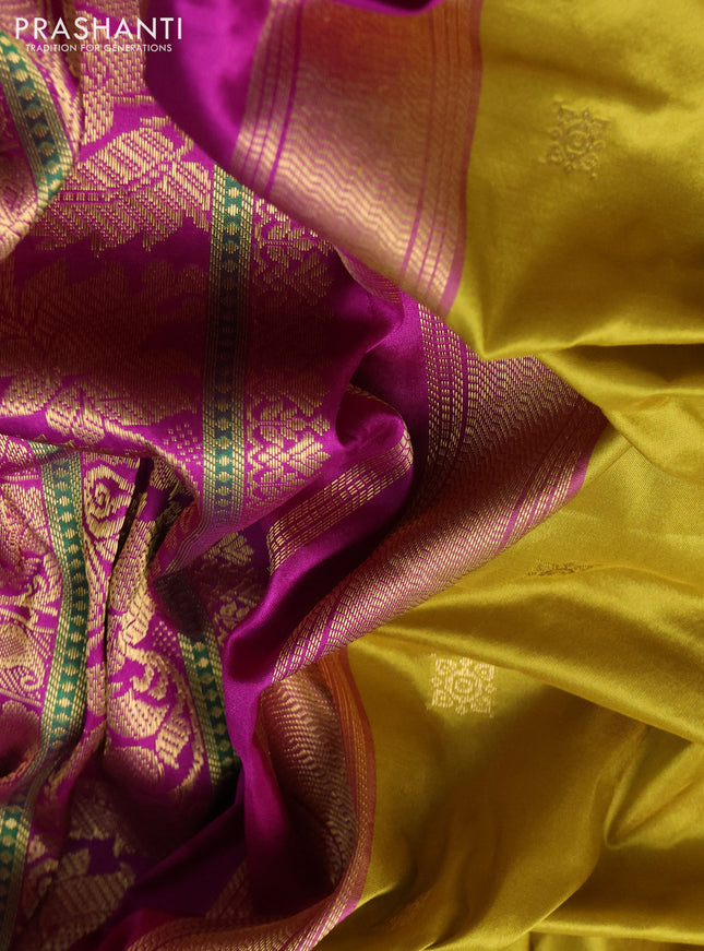 Narayanpet silk saree mehendi green and purple with zari woven buttas and temple design zari woven border