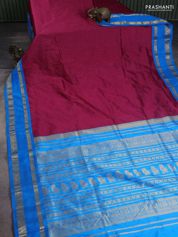 Narayanpet silk saree dark magenta and cs blue with allover small checked pattern and rettapet annam zari woven korvai border