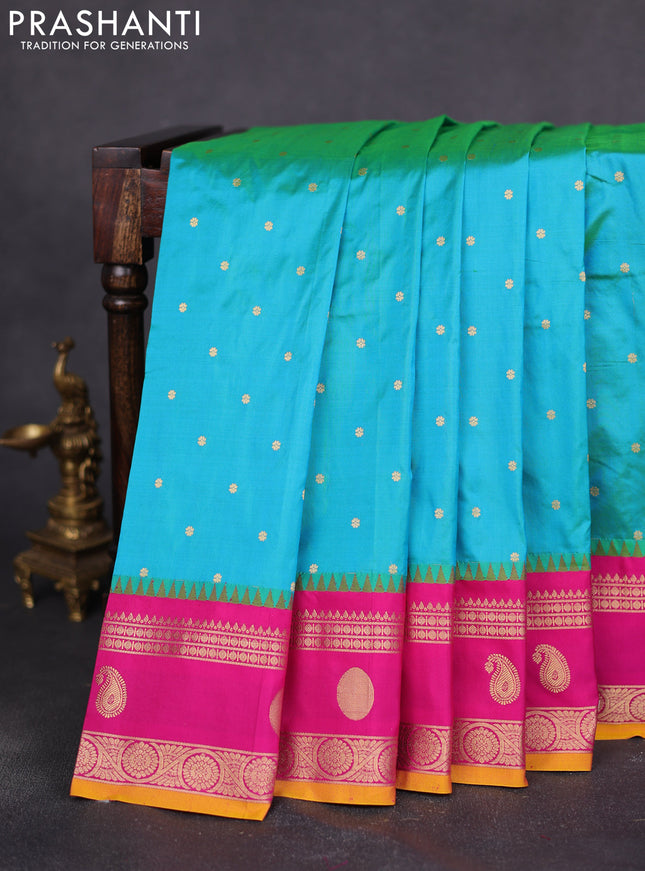 Narayanpet silk saree dual shade of teal green and pink with allover zari woven buttas and rettapet zari woven butta border