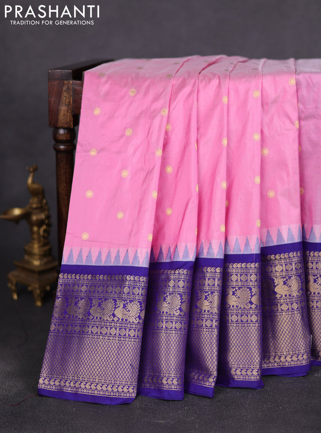 Narayanpet silk saree light pink and navy blue with allover zari woven buttas and temple design long zari woven border