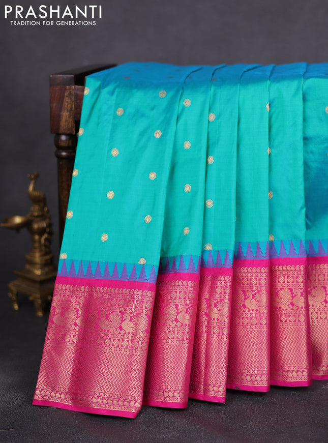 Narayanpet silk saree teal blue and pink with allover zari woven buttas and temple design long zari woven border