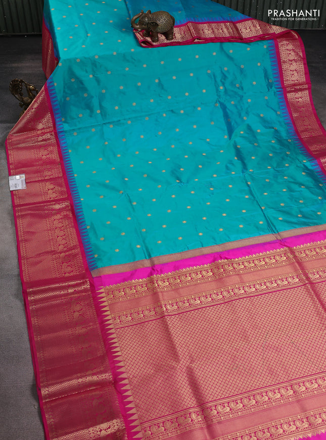 Narayanpet silk saree teal blue and pink with allover zari woven buttas and temple design long zari woven border