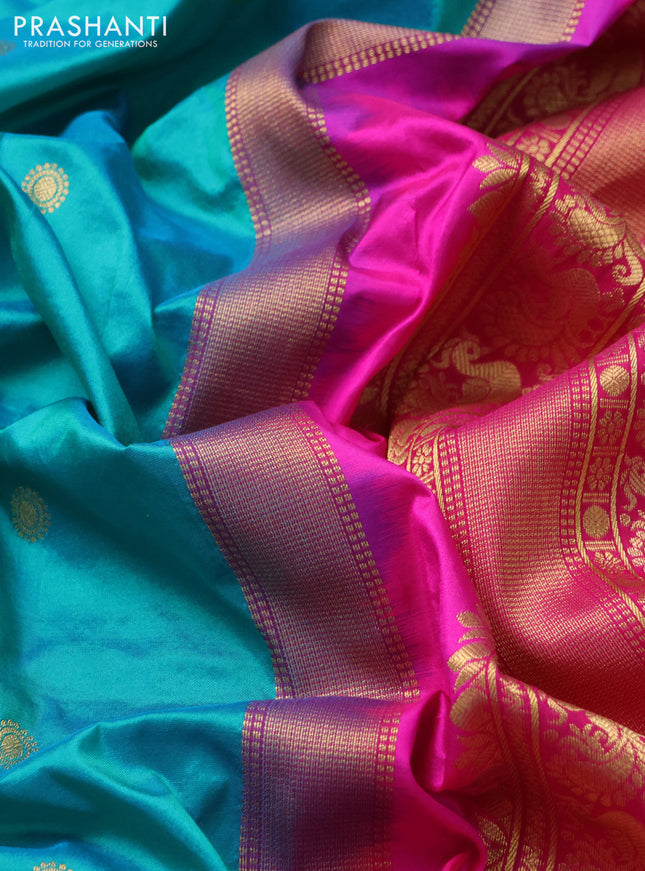 Narayanpet silk saree teal blue and pink with allover zari woven buttas and temple design long zari woven border