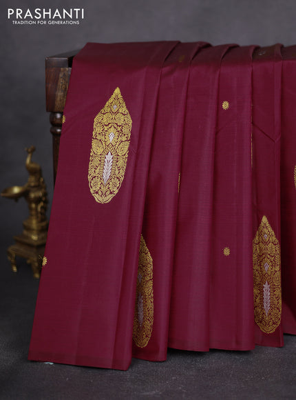 Pure kanchipuram silk saree maroon and green with zari woven buttas in borderless style