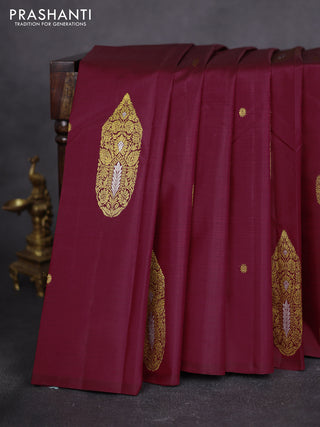 Pure kanchipuram silk saree maroon and green with zari woven buttas in borderless style