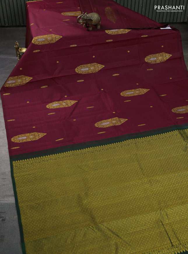 Pure kanchipuram silk saree maroon and green with zari woven buttas in borderless style