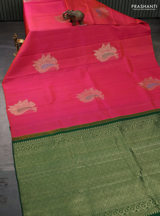 Pure kanchipuram silk saree dual shade of pinkish orange and green with zari woven buttas in borderless style