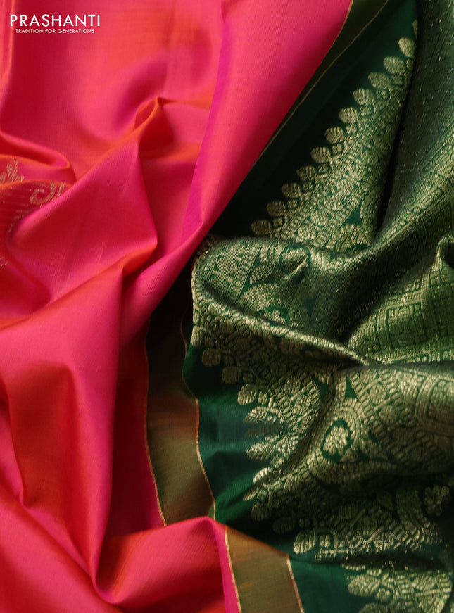 Pure kanchipuram silk saree dual shade of pinkish orange and green with zari woven buttas in borderless style