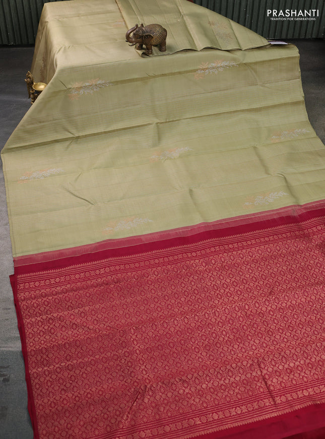 Pure kanchipuram silk saree pista green and maroon with allover silver zari weaves & buttas in borderless style