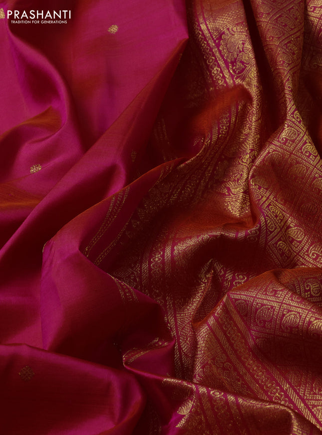 Pure kanchipuram silk saree dual shade of pinkish orange with zari woven buttas and zari woven border