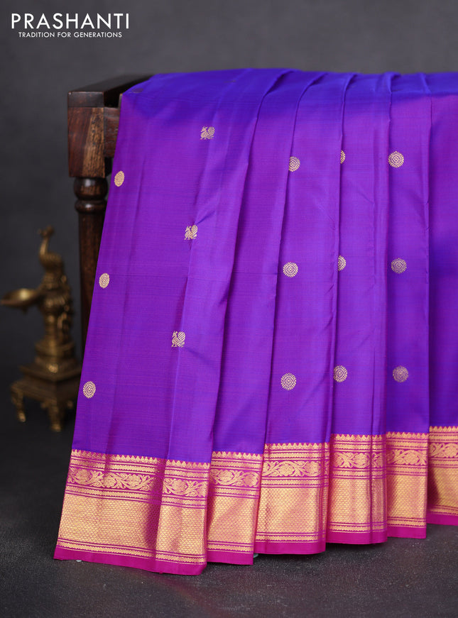 Pure kanchipuram silk saree dual shade of purple and pink with allover annam zari woven buttas and zari woven border