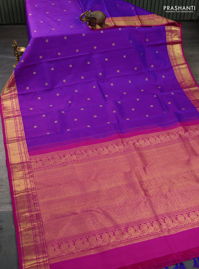 Pure kanchipuram silk saree dual shade of purple and pink with allover annam zari woven buttas and zari woven border