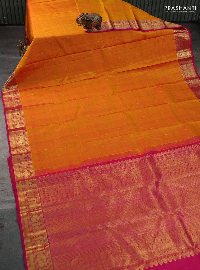 Pure kanchipuram silk saree mustard yellow and pink with zari woven buttas and zari woven border