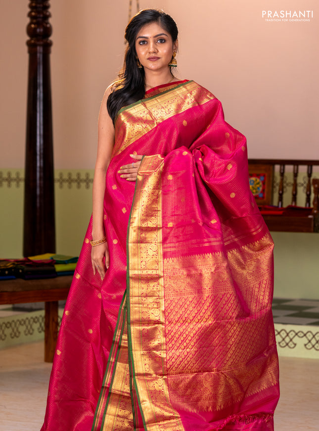 Pure kanchipuram silk saree pink and green with allover zari checks & buttas and zari woven border