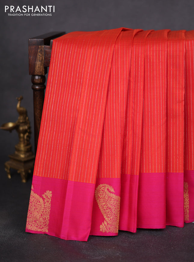 Pure kanchipuram silk saree orange and pink with allover silver & gold zari weaves and zari woven butta border
