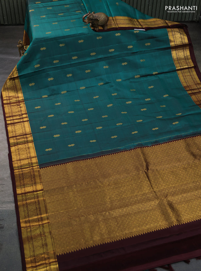 Pure kanchipuram silk saree peacock green and coffee brown with zari woven buttas and zari woven border