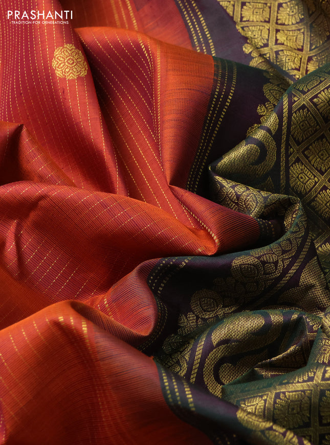 Pure kanchipuram silk saree rustic orange and bottle green with allover zari weaves & buttas and rettapet zari woven border