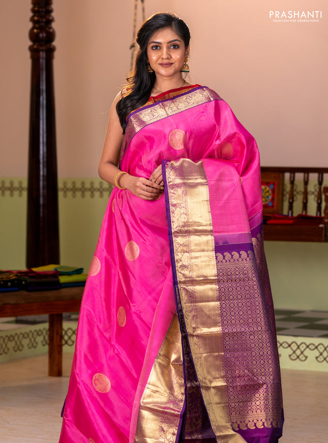 Pure kanchipuram silk saree light pink and purple with allover annam zari woven buttas and zari woven border