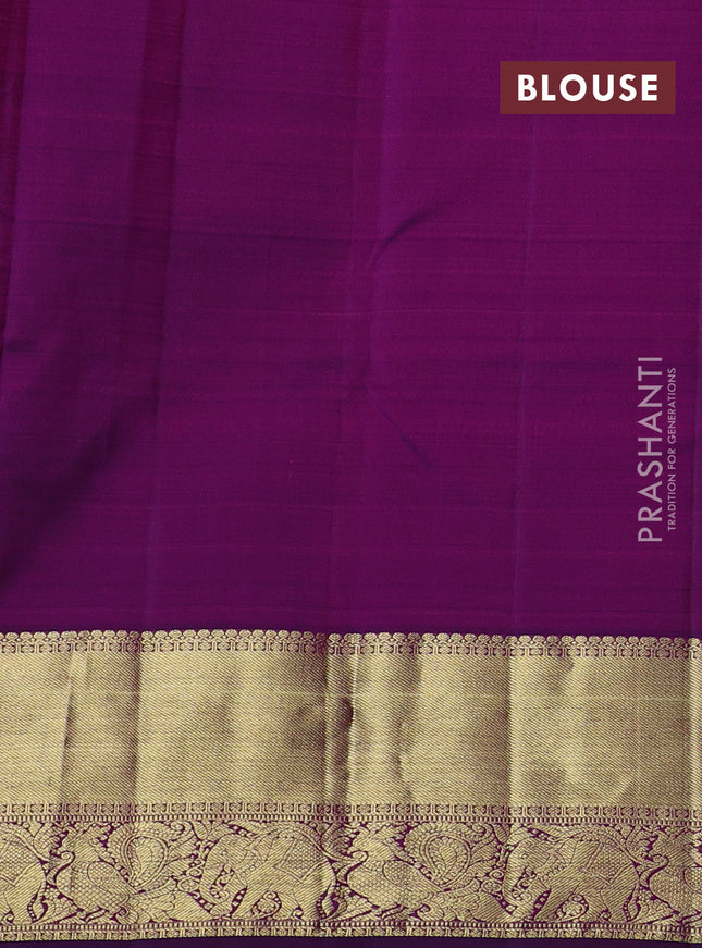 Pure kanchipuram silk saree light pink and purple with allover annam zari woven buttas and zari woven border