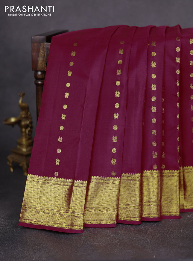 Pure kanchipuram silk saree maroon with allover annam zari woven buttas and zari woven border