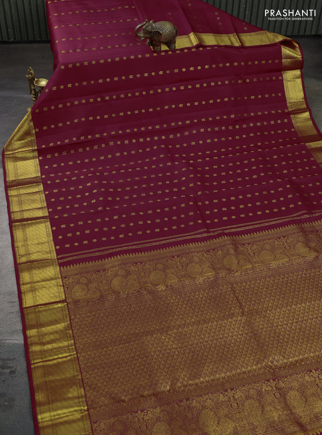 Pure kanchipuram silk saree maroon with allover annam zari woven buttas and zari woven border