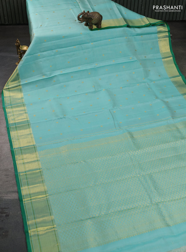 Pure kanchipuram silk saree teal blue and green with allover zari weaves & buttas and zari woven border
