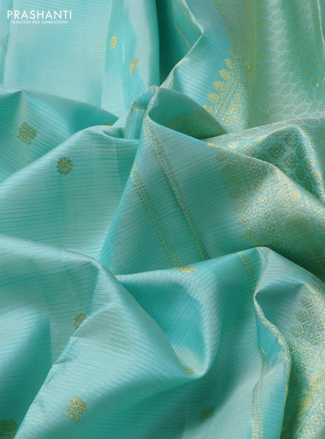 Pure kanchipuram silk saree teal blue and green with allover zari weaves & buttas and zari woven border