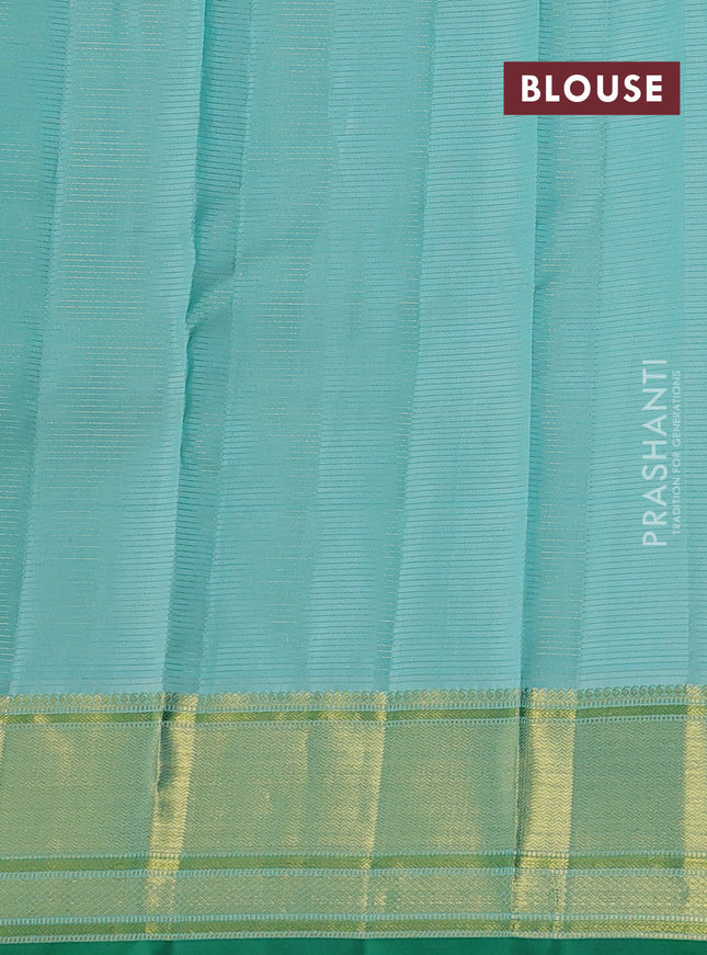 Pure kanchipuram silk saree teal blue and green with allover zari weaves & buttas and zari woven border