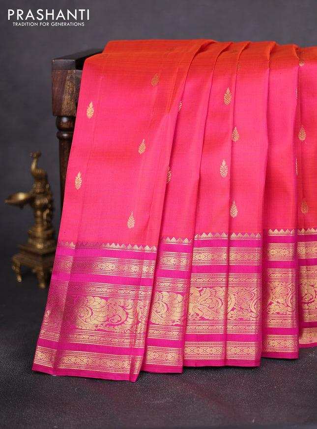 Pure kanchipuram silk saree dual shade of pinkish orange and pink with zari woven buttas and long zari woven border