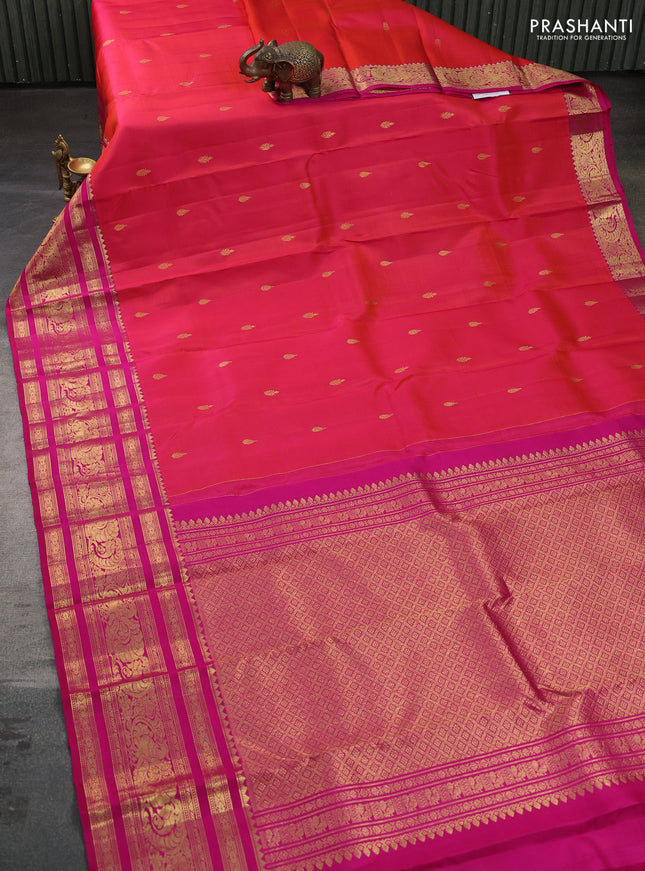 Pure kanchipuram silk saree dual shade of pinkish orange and pink with zari woven buttas and long zari woven border