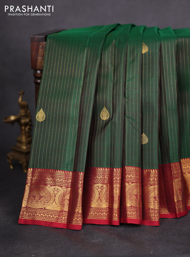 Pure kanchipuram silk saree green and maroon with allover zari weaves & buttas and zari woven border
