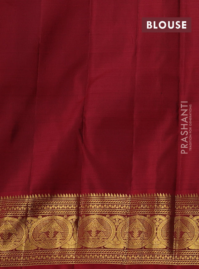 Pure kanchipuram silk saree green and maroon with allover zari weaves & buttas and zari woven border