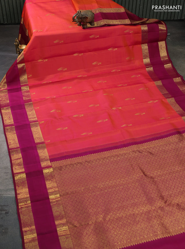 Pure kanchipuram silk saree dual shade of pinkish orange and magenta pink with zari woven buttas and rettapet zari woven border