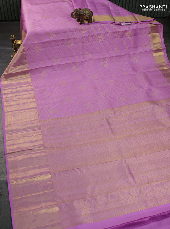 Pure kanchipuram silk saree lotus pink with allover zari checks & buttas and long zari woven border