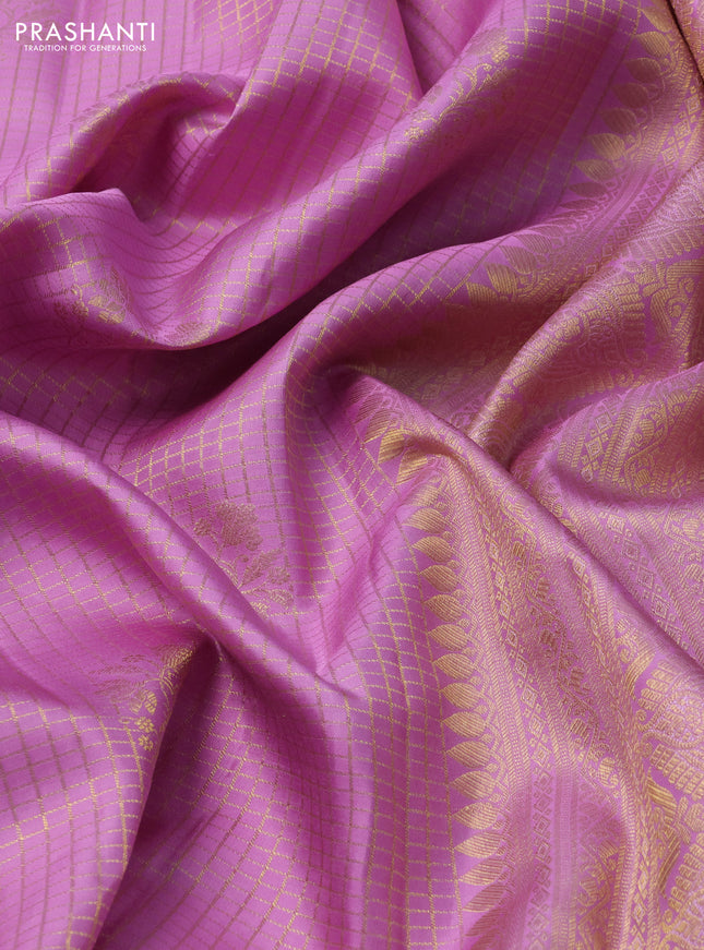 Pure kanchipuram silk saree lotus pink with allover zari checks & buttas and long zari woven border