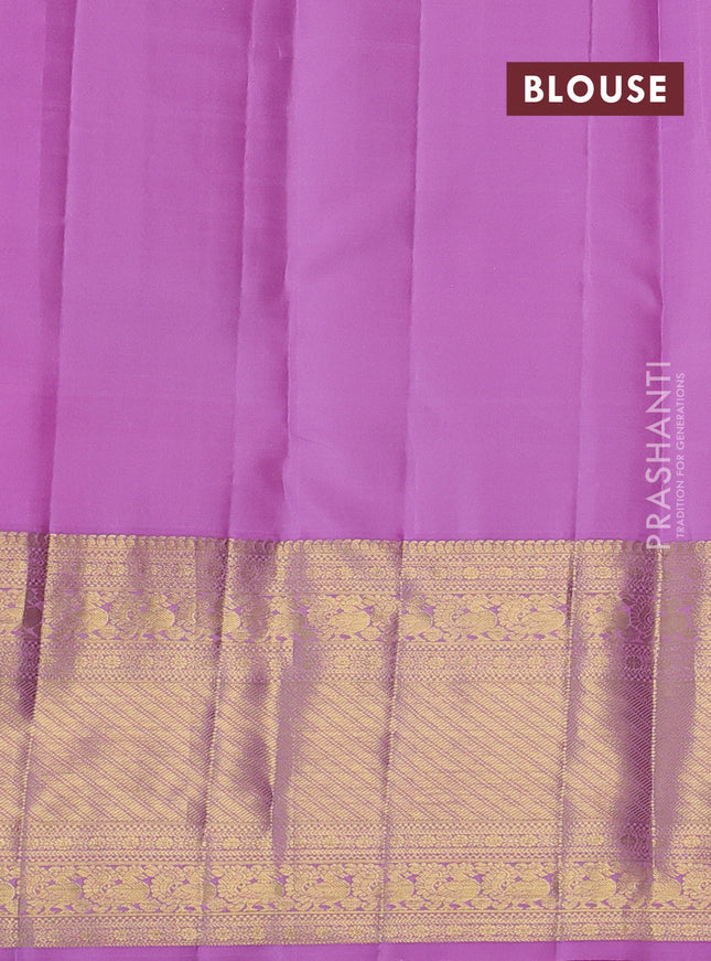 Pure kanchipuram silk saree lotus pink with allover zari checks & buttas and long zari woven border